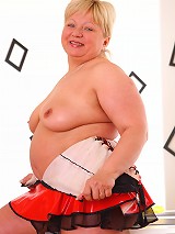 Plump chubby slut bouncing on top of a corn dildo